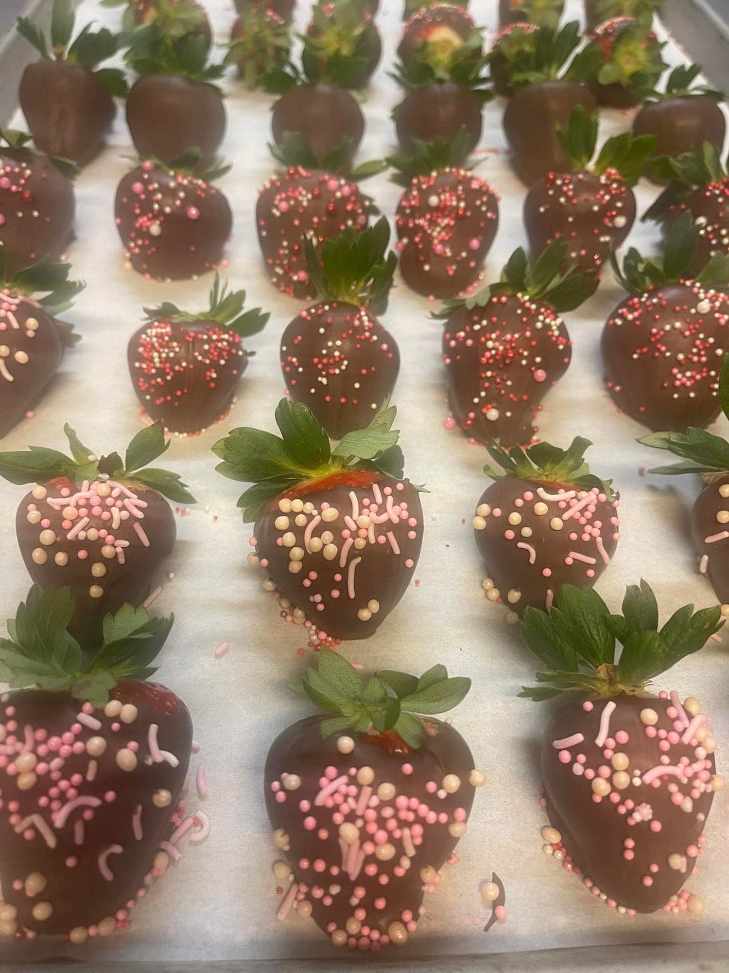 Valentine dipped strawberries with sprinkles